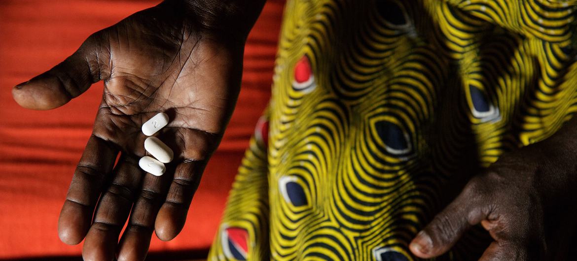 In the Côte d'Id Ivoire a woman who lives with HIV, she has three pills she takes daily as part of antiretroviral therapy. In the Côte d'Id Ivoire a woman who lives with HIV, she has three pills she takes daily as part of antiretroviral therapy.