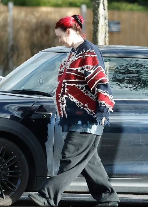 Anne-Marie Flaunts baby pump in public look
