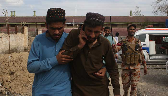 Plain clothing safety strength staff who were rescued from a train after it was attacked by militants leaves Mach Railway Station in Mach, Balochistan, March 12, 2025. - Reuters 
