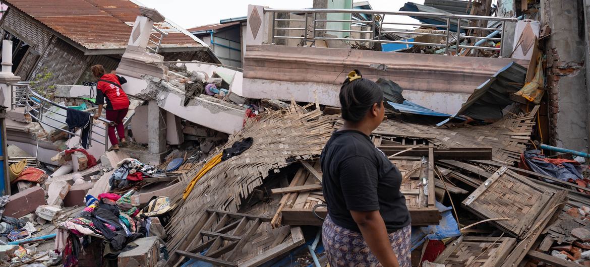 A woman in Mandalay, Myanmar, looks at the destruction caused by the earthquake. A woman in Mandalay, Myanmar, looks at the destruction caused by the earthquake.