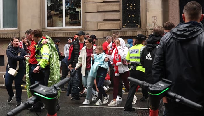 Football football - Premier League - Liverpool Victory Parade - Liverpool, UK - 26 May 2025 Liverpool fans look at after more people were hit by a car under Victory Parade. - Reuters