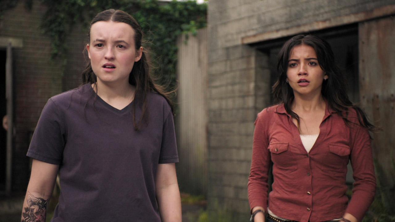 Ellie and Dina standing and looks shocked in the last of us season 2 paragraph 4