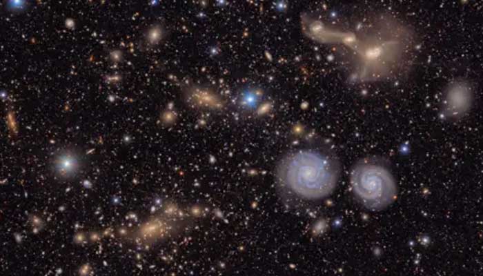 On just a small section of Rubin Observatory's Total View of the Virgo Cluster shines bright stars in the foreground in front of many distant galaxies. - Vera C Rubin Observatory/AFP