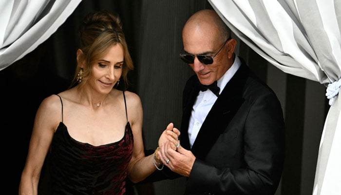 Lisa Bezos and Mark Bezos, half-brother of Amazons founder Jeff Bezos, leaving Aman Hotel on wedding day Jeff Bezos with Lauren Sanchez in Venice on June 27, 2025.-AFP