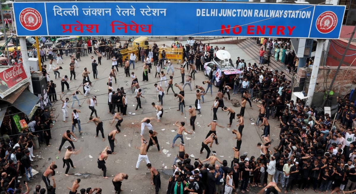 Mourning uses razors to flag the themselves under the memorial of Ashura in New Delhi, India, July 6, 2025. - Reuters
