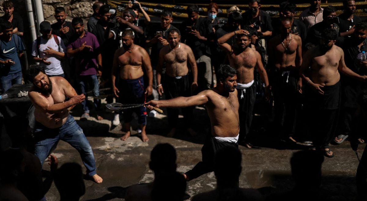 Mourning, living in Greece flags even during a Muharram procession to mark Ashura, in Piraeus, Greece, July 6, 2025. - Reuters
