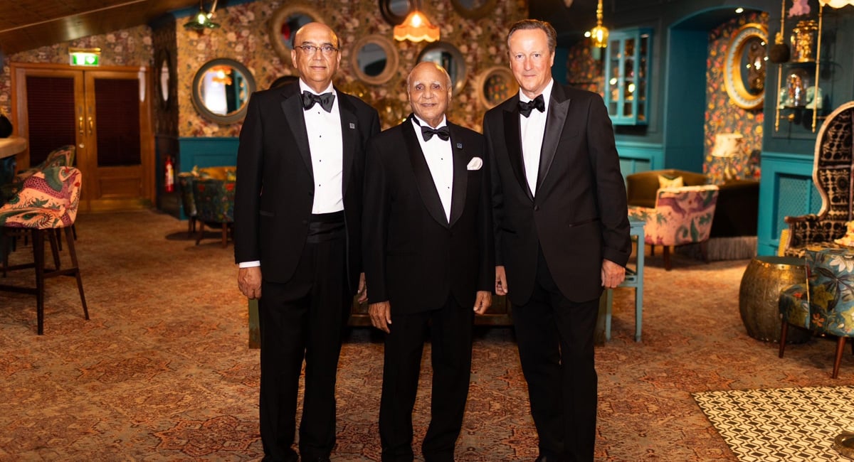 (From left) President of Bestway Group Lord Zamer Choudrey CBE SI (PK), Bestway Group founder Sir Anwar Perez OBE and former British Prime Minister Lord David Cameron can be seen during the celebration of the 50th anniversary of Bestway at Royal Albert Hall, London, Britain. - Reporter