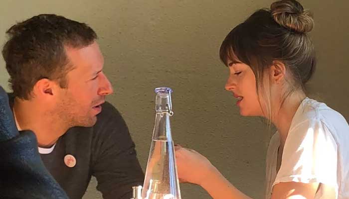 Chris Martin with Dakota Johnson