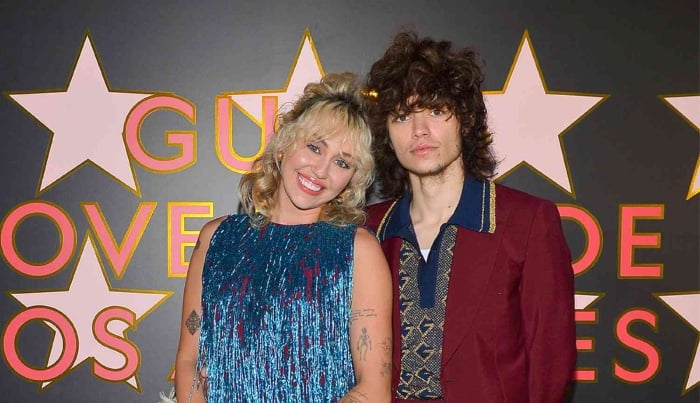 Photo: Miley Cyrus leans on Beau Maxx Marondo