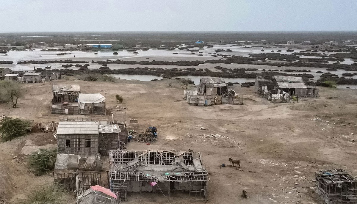 Abandoned houses are depicted in one of the villages of Kharo Chan Town, in the Indus Delta on June 25, 2025. - AFP