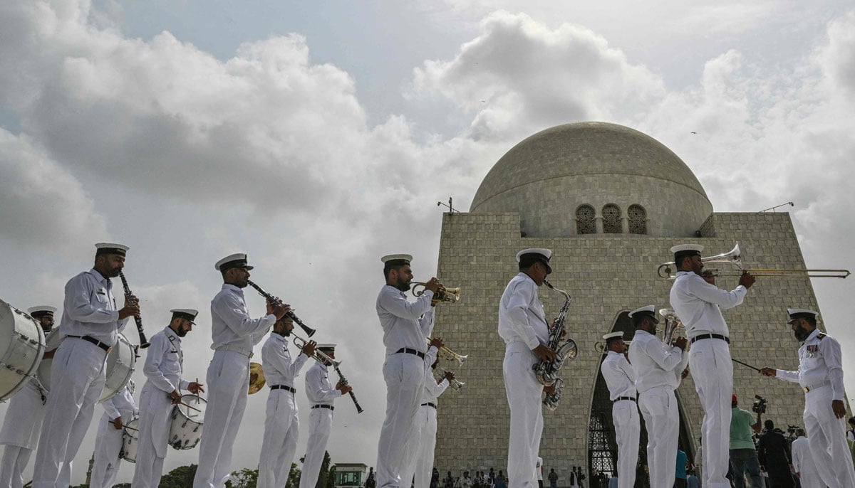 Pakistani fleet cadets play the national anthem at Mausoleum in Muhammad Ali Jinnah, during the independence day celebrations in Karachi on August 14, 2025. - AFP