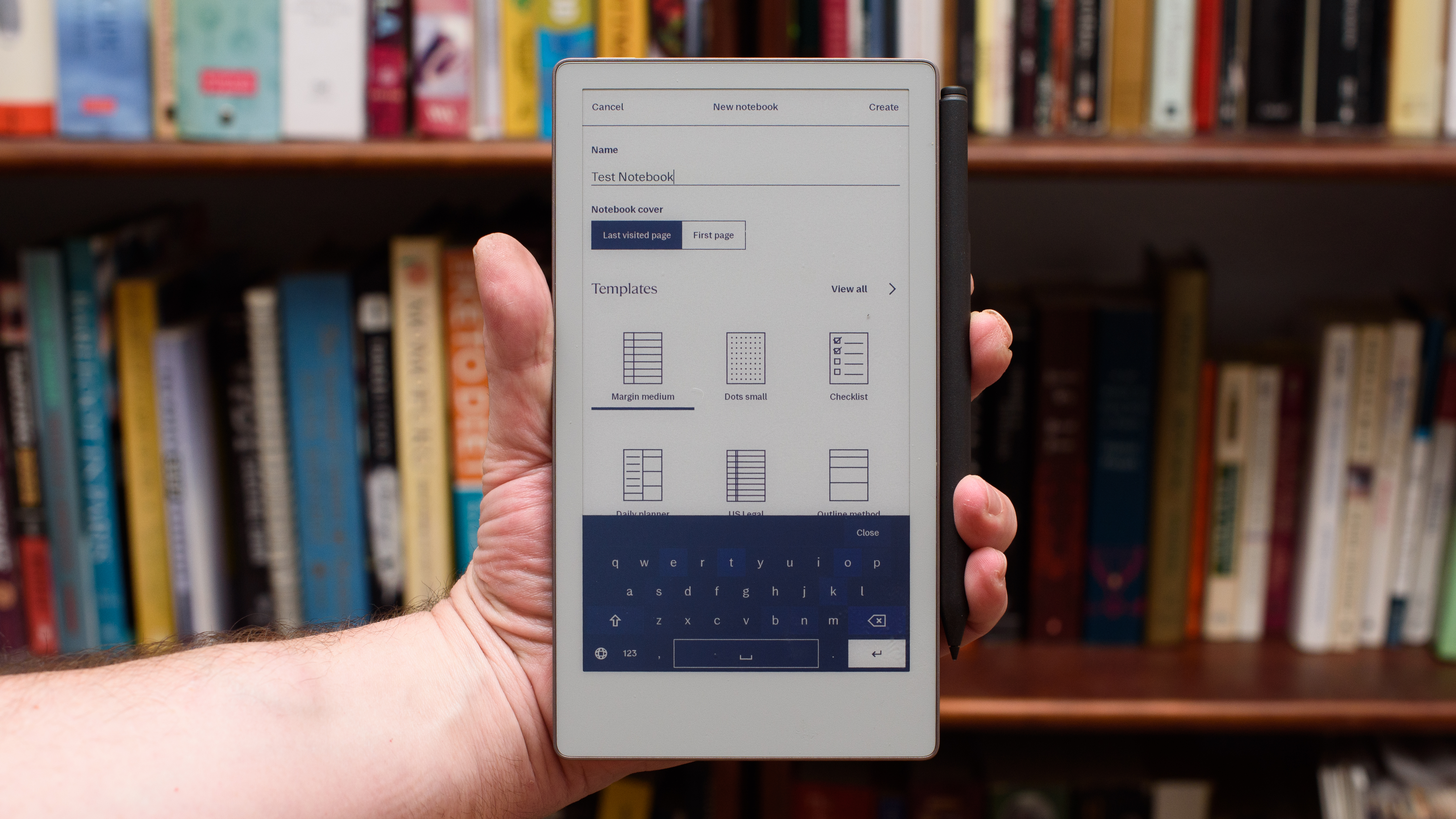 Remarkable Paper Pro MOV Tablet in front of a library of books showing different writing screens and comparing the size with a moleskine -notebook