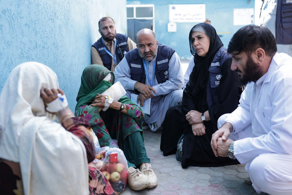 On September 2, 2025, Dr. Abdul Mateen Sahak and his WHO team Two women at the regional hospital in Asadabad in the Kunar province, who had lost all their family members in earthquakes on August 31, 2025.