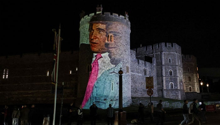 US President Donald Trump with the disgraceful financier Jeffrey Epstein is projected at Windsor Castle, in Windsor, Berkshire, Britain September 16, 2025. Reuters/Phil Noble