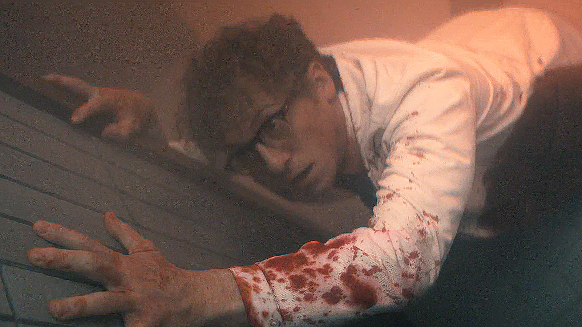 Thomas Godolkin reaches for a fire alarm in Gen V season 2 section 1