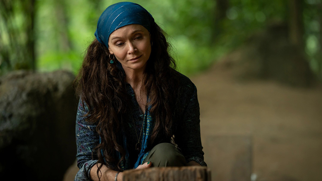 Lady Sylvia kneeling at a grave in Alien: Earth Season 1 Section 8
