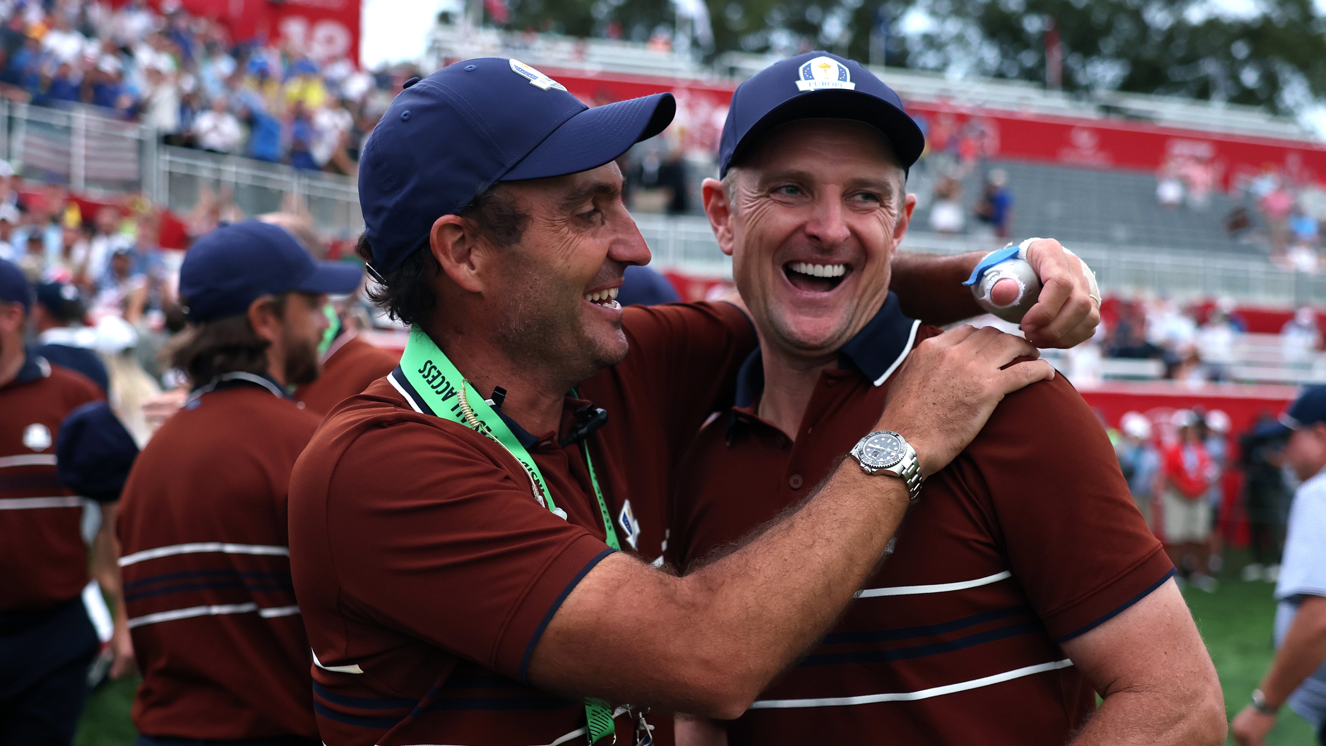 Deputy Captain Edoardo Molinari and Justin Rose from Team Europe celebrate the 18th green after Saturday afternoon Four-balls matches in the 2025 Ryder Cup on Black Course at Bethpage State Park Golf Course on September 27, 2025 in Farmingdale, New York.