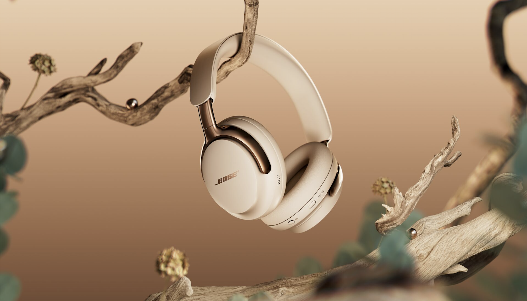 Bose QCU -Headphones (2. Gen) in 'Operationwood Sand' on the tree branch, with pearls that also grow on the tree