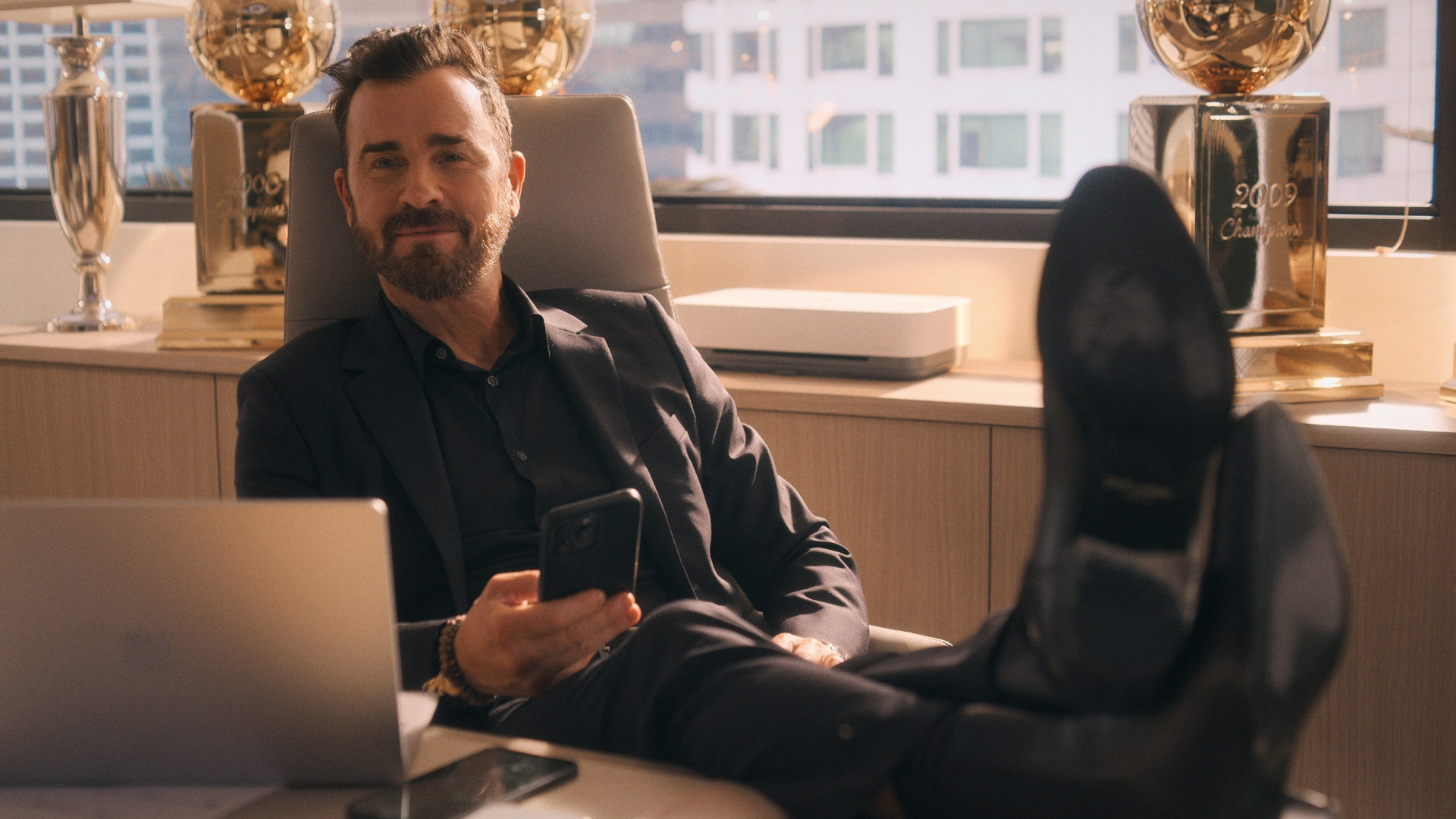 Cam puts the feet on the desk in running point