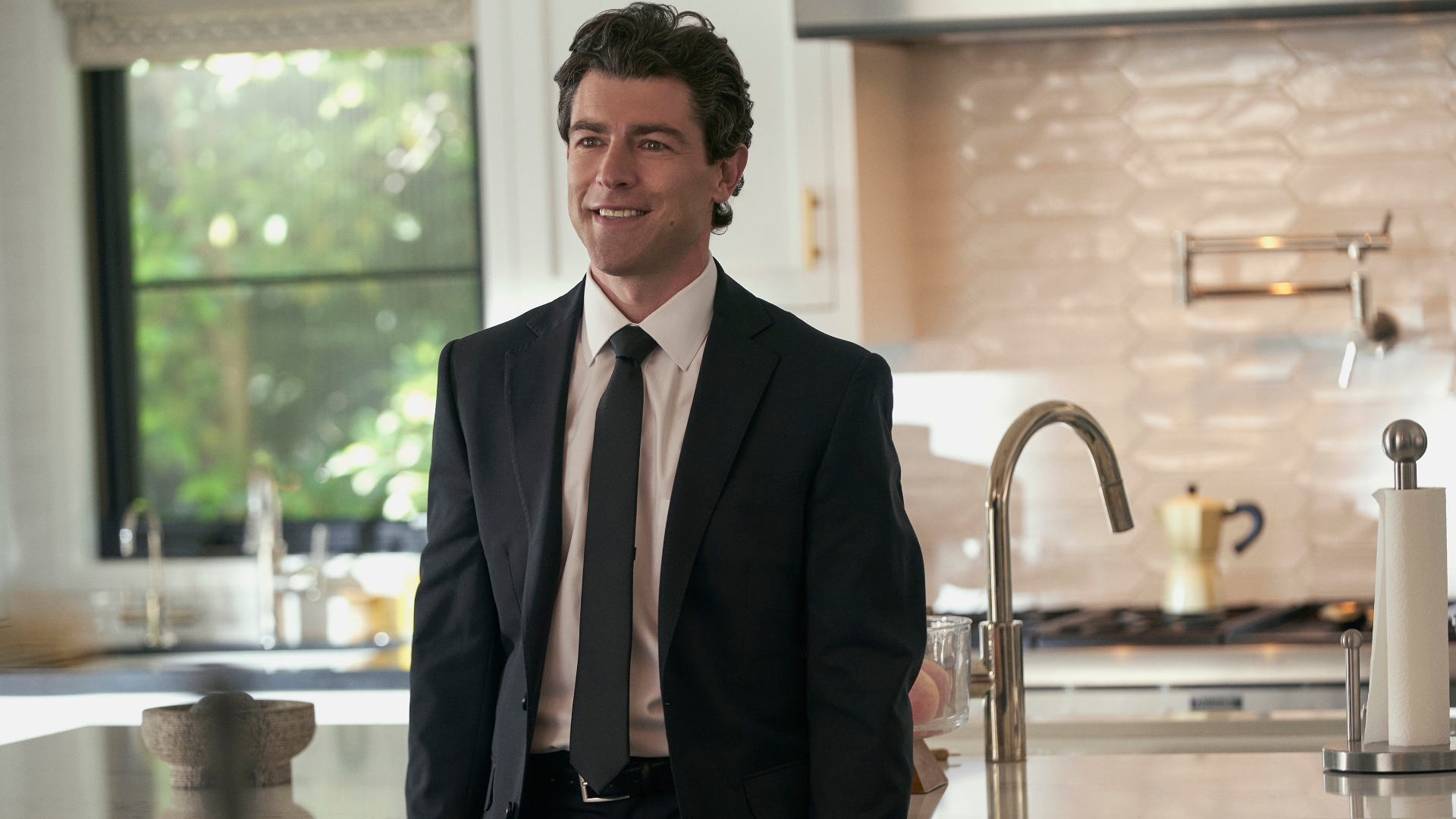 LEV stands in a kitchen in running point