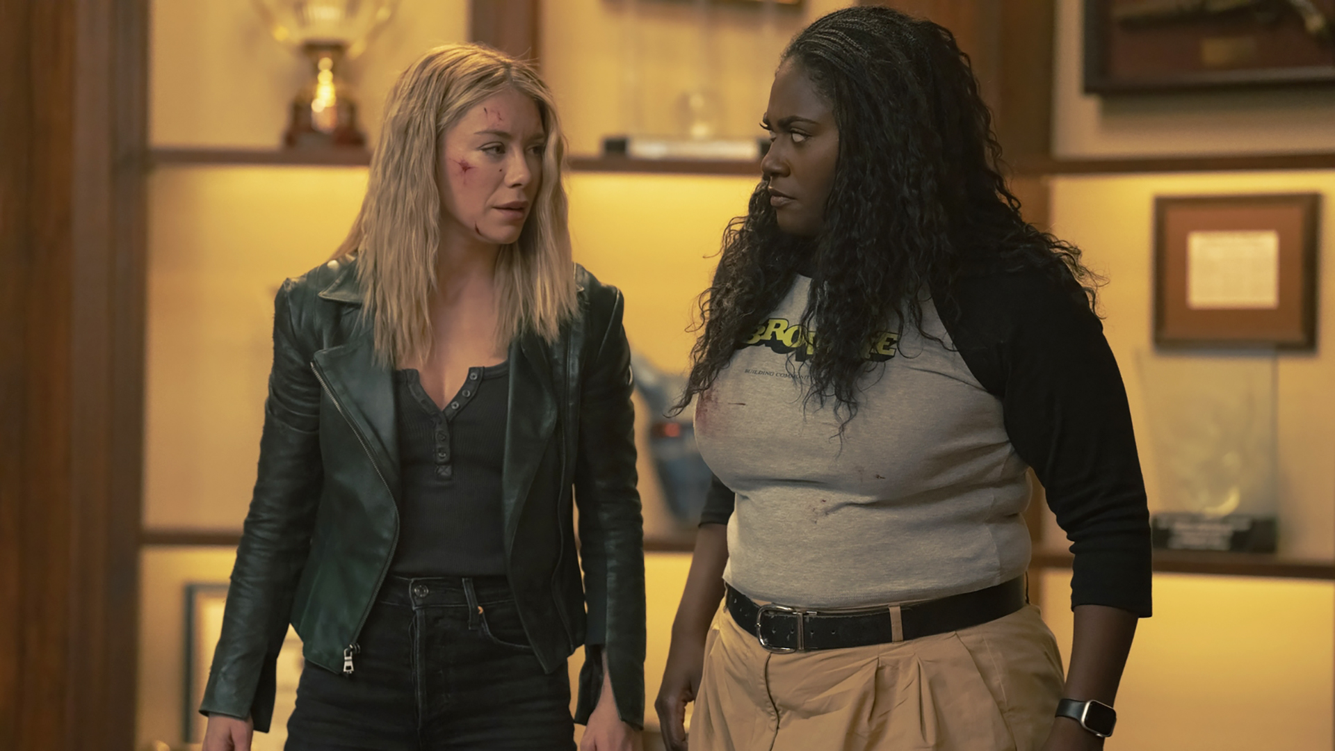 Emilia Harcourt and Leota Adebayo look at each other in Peacemaker season 2 section 7