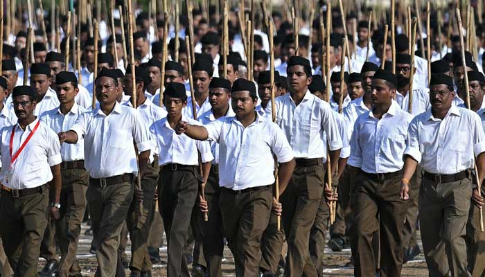 Volunteers of the Rashtriya Swayamsevak Sangh (RSS) take part in the centenary celebrations of the Hindu nationalist organization at the Reshimbagh Ground in Nagpur on October 2, 2025. — AFP