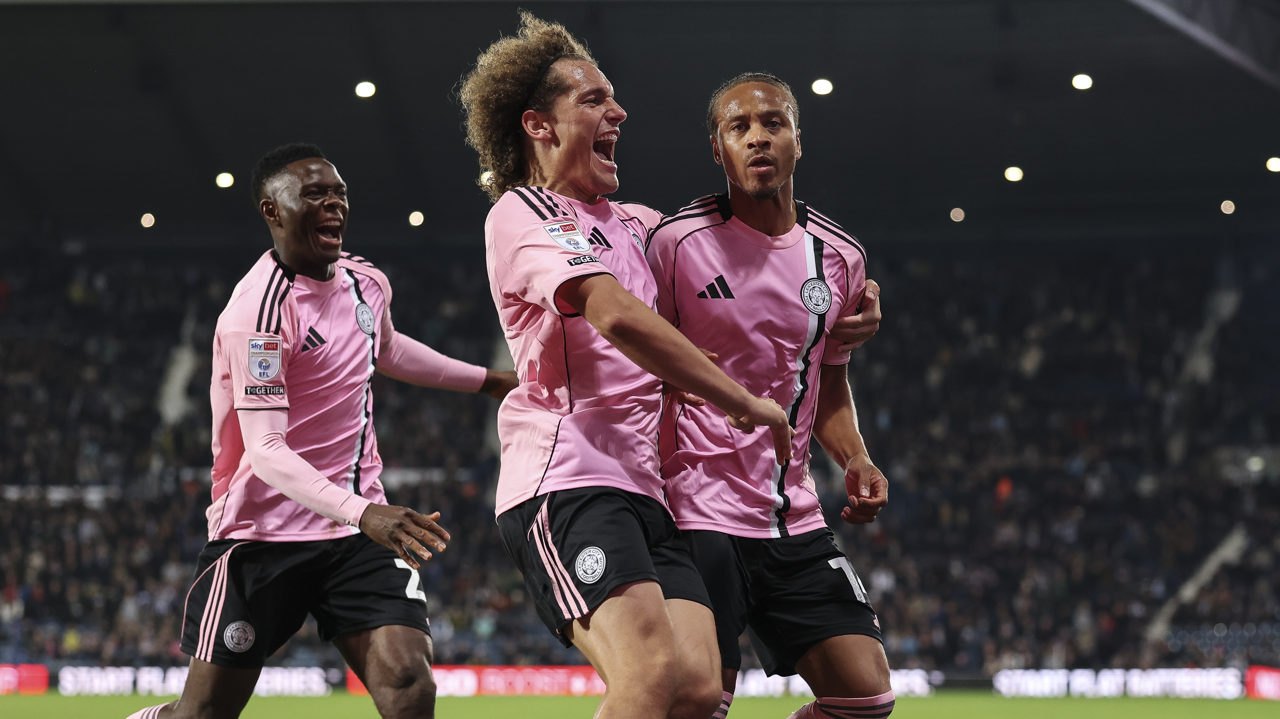 Bobby de Cordova-Reid from Leicester City celebrates with Wout Faes after scoring the team's first goal under the Sky Bet Championship match between West Bromwich Albion and Leicester City on Hawthorns on September 26, 2025 in West Bromwich, England.