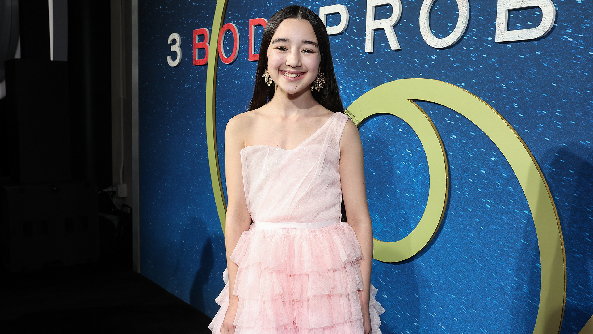 Eve Ridley poses for a photograph on the premiere of Netflix 's 3 Body problem TV series