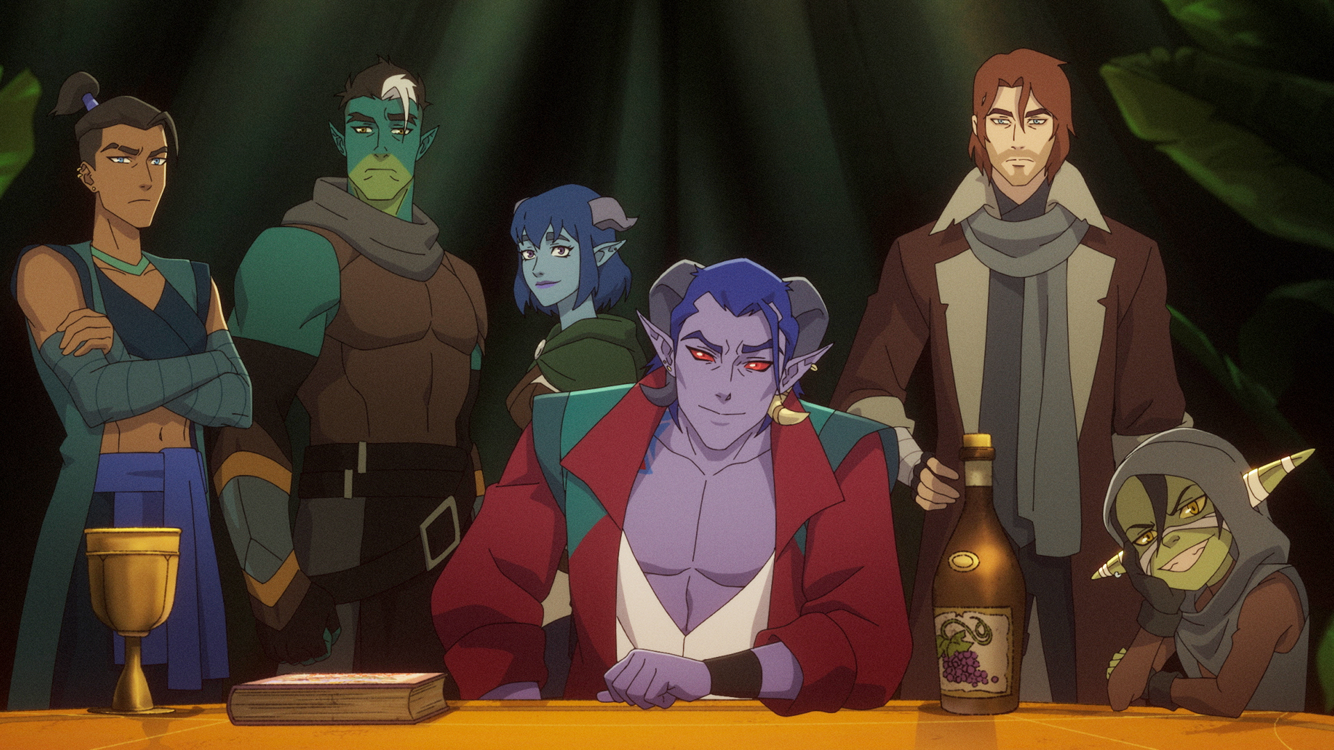 Mollymauk sits at a table while the rest of The Mighty Nein stand behind it