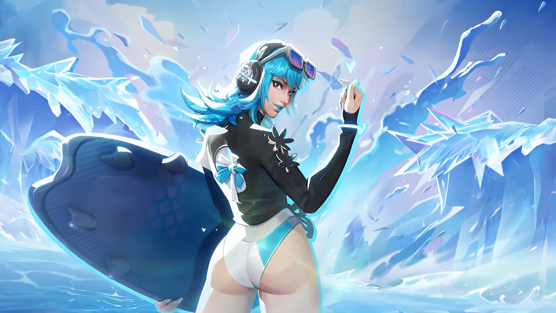 Luna Snow holds a surfboard and poses as the waves crash in the background