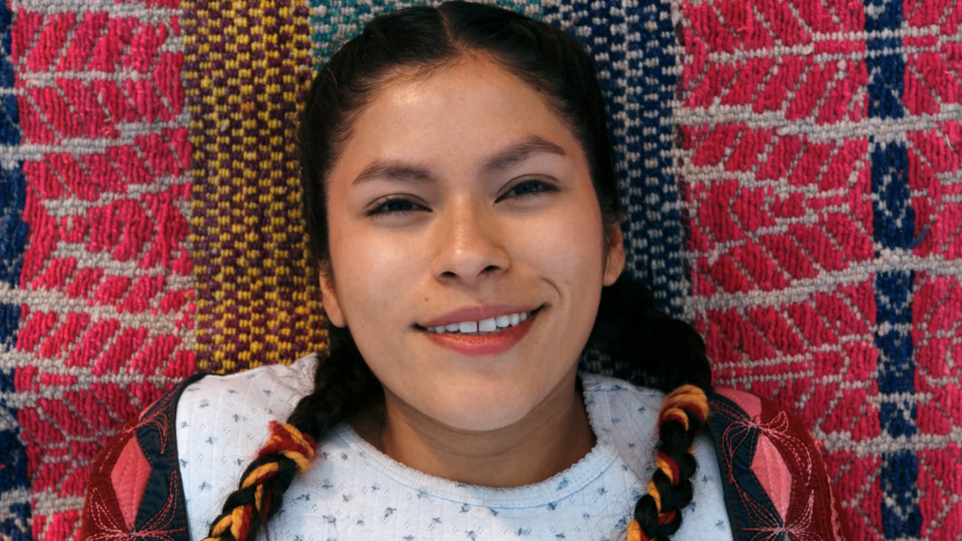 Kusimayu smiles after being converted to join The Others in Pluribus episode 9