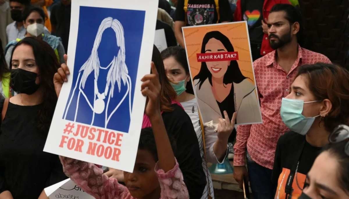 Women's rights activists hold placards during a demonstration in Lahore on July 24, 2021 against the brutal killing of Noor Mukadam in Islamabad. — AFP/file