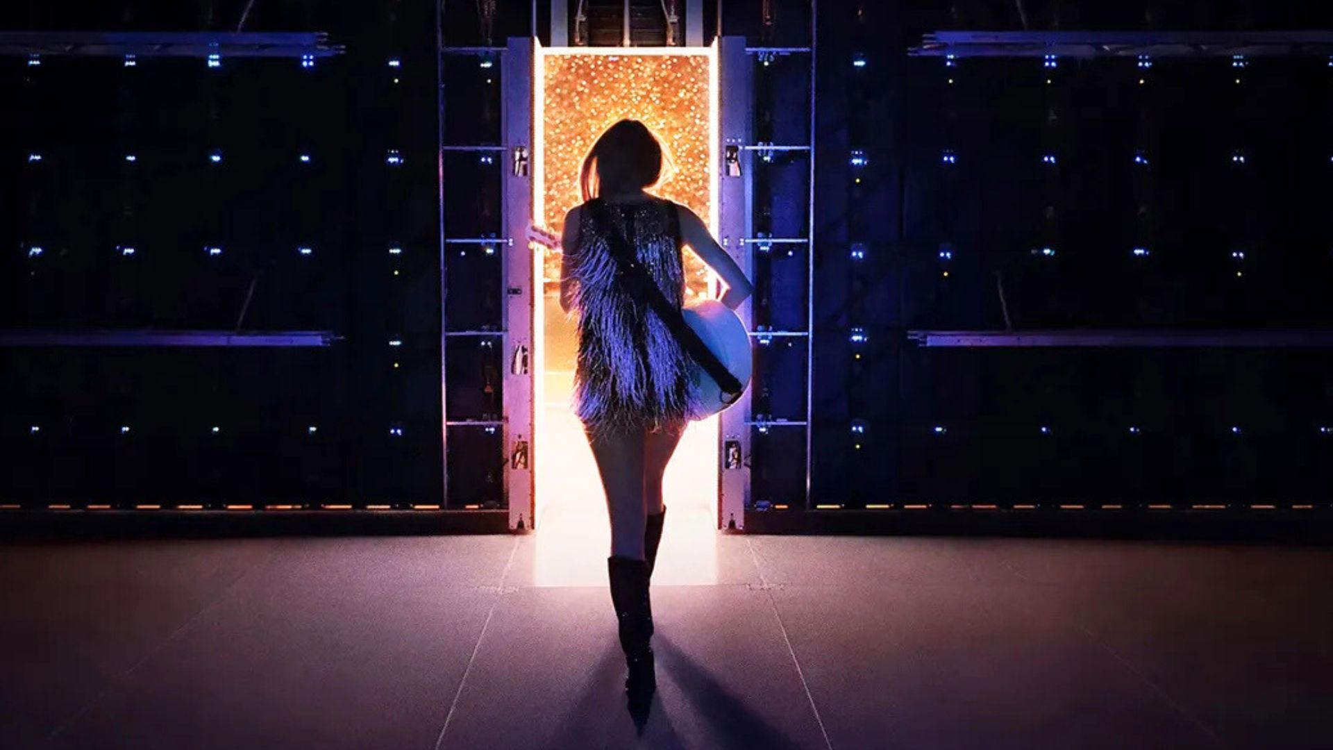 Taylor Swift walks through the stage doors