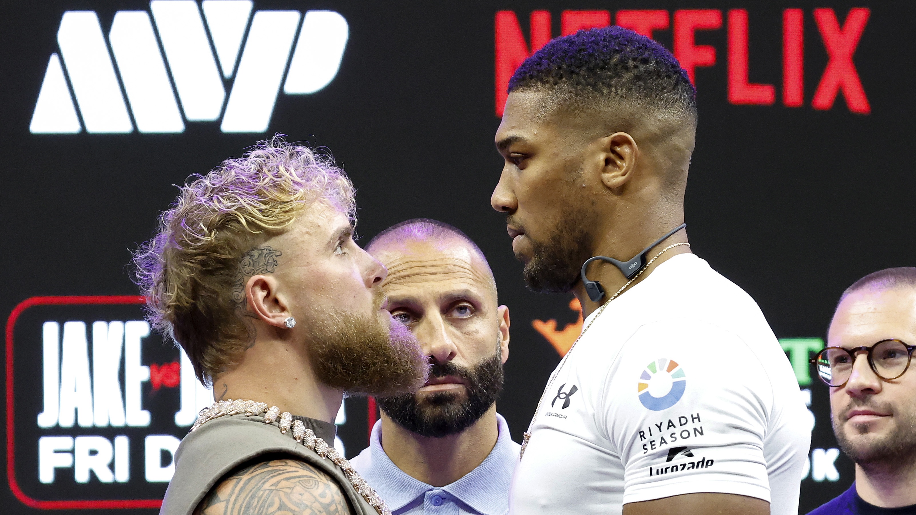 Jake Paul faces Anthony Joshua ahead of their heavyweight boxing match live on Netflix.