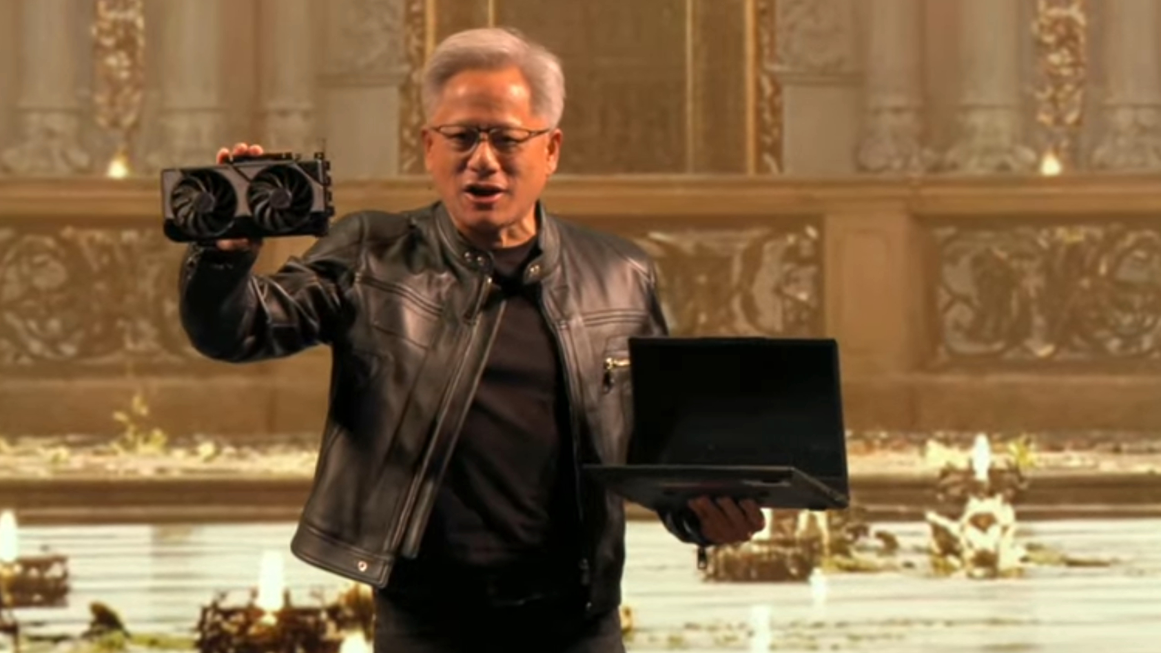 Nvidia CEO Jensen Huang holds an RTX 5060 at Computex 2025