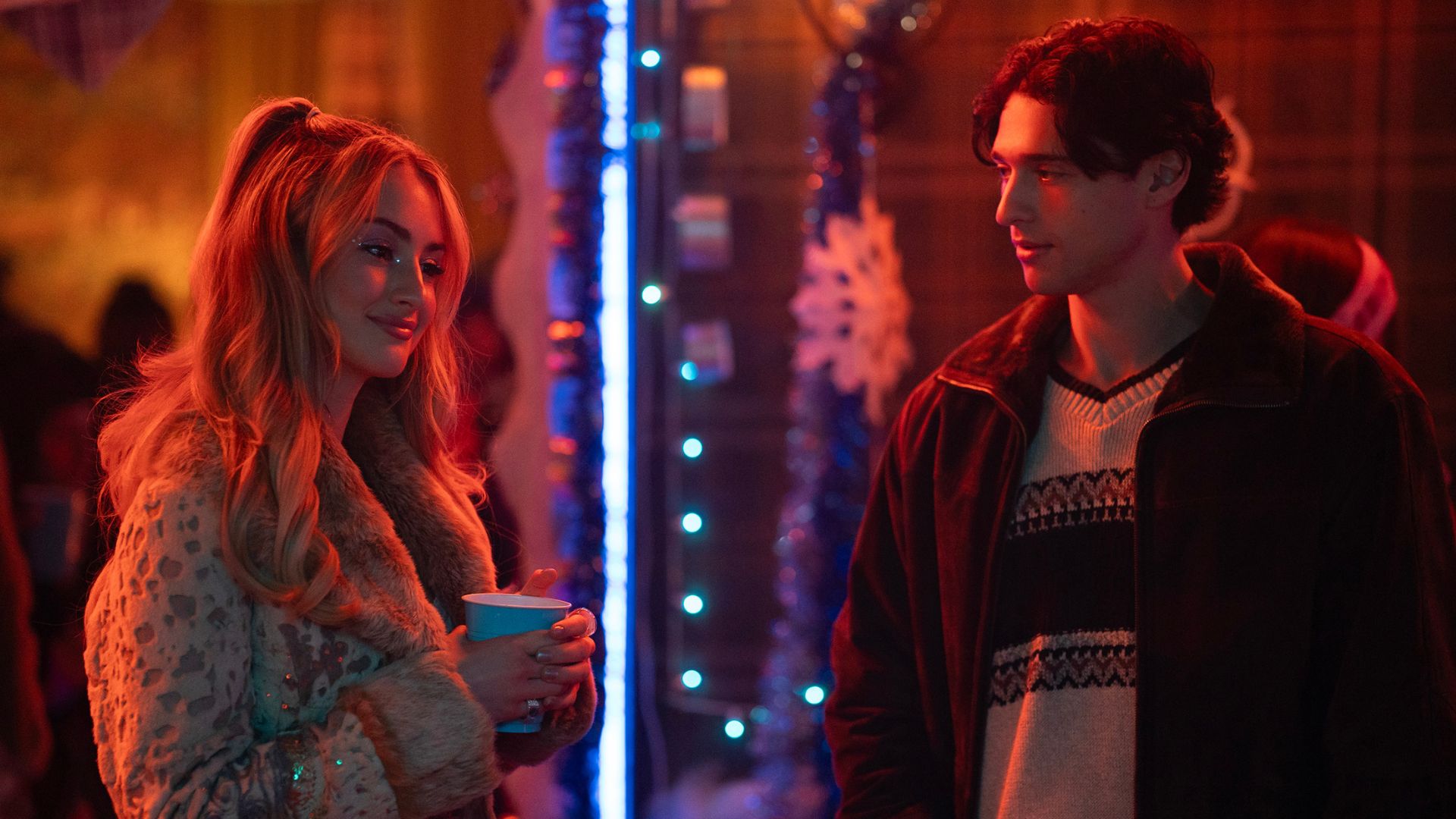 Lucy and Stephen are talking at a party