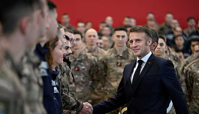 French President Emmanuel Macron shakes hands with soldiers as he visits Istres military air base, southern France, January 15, 2026. — Reuters