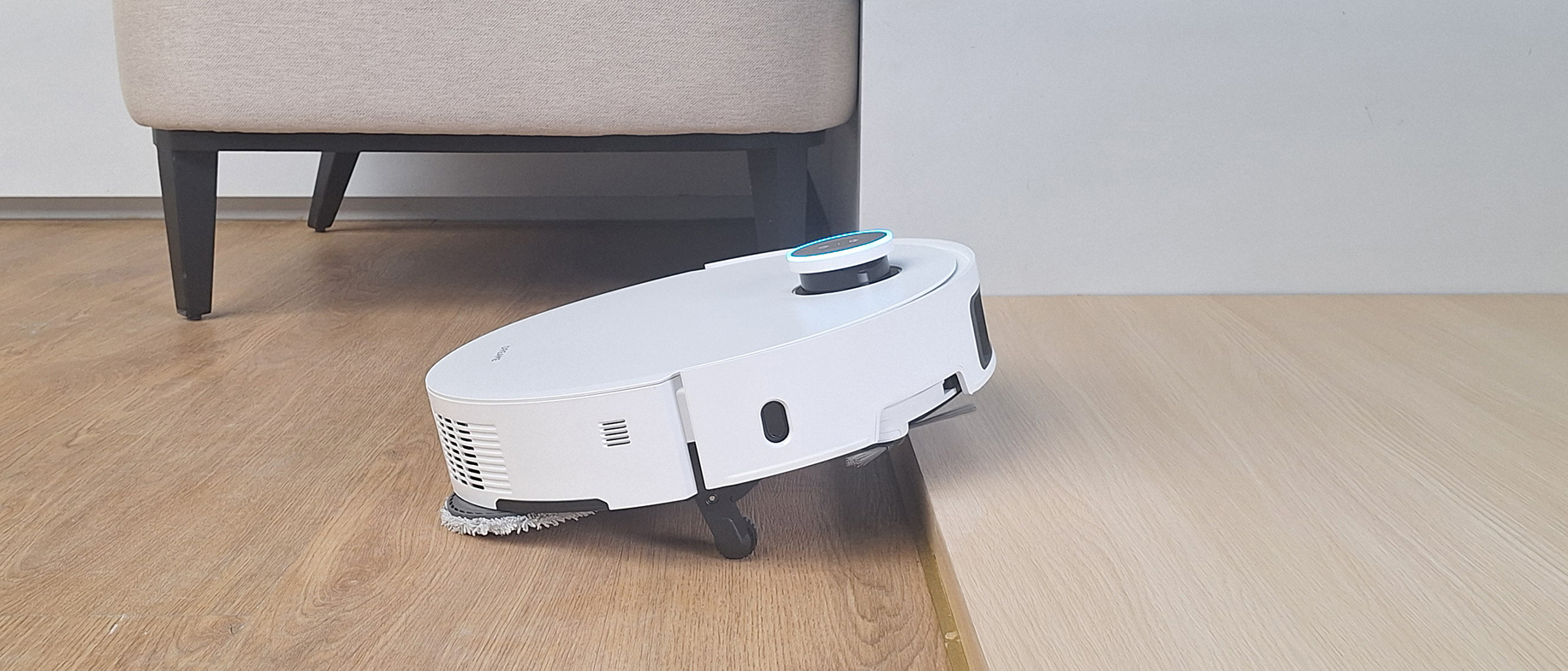 Dreame X50 Ultra robot vacuum cleaner that climbs over a step