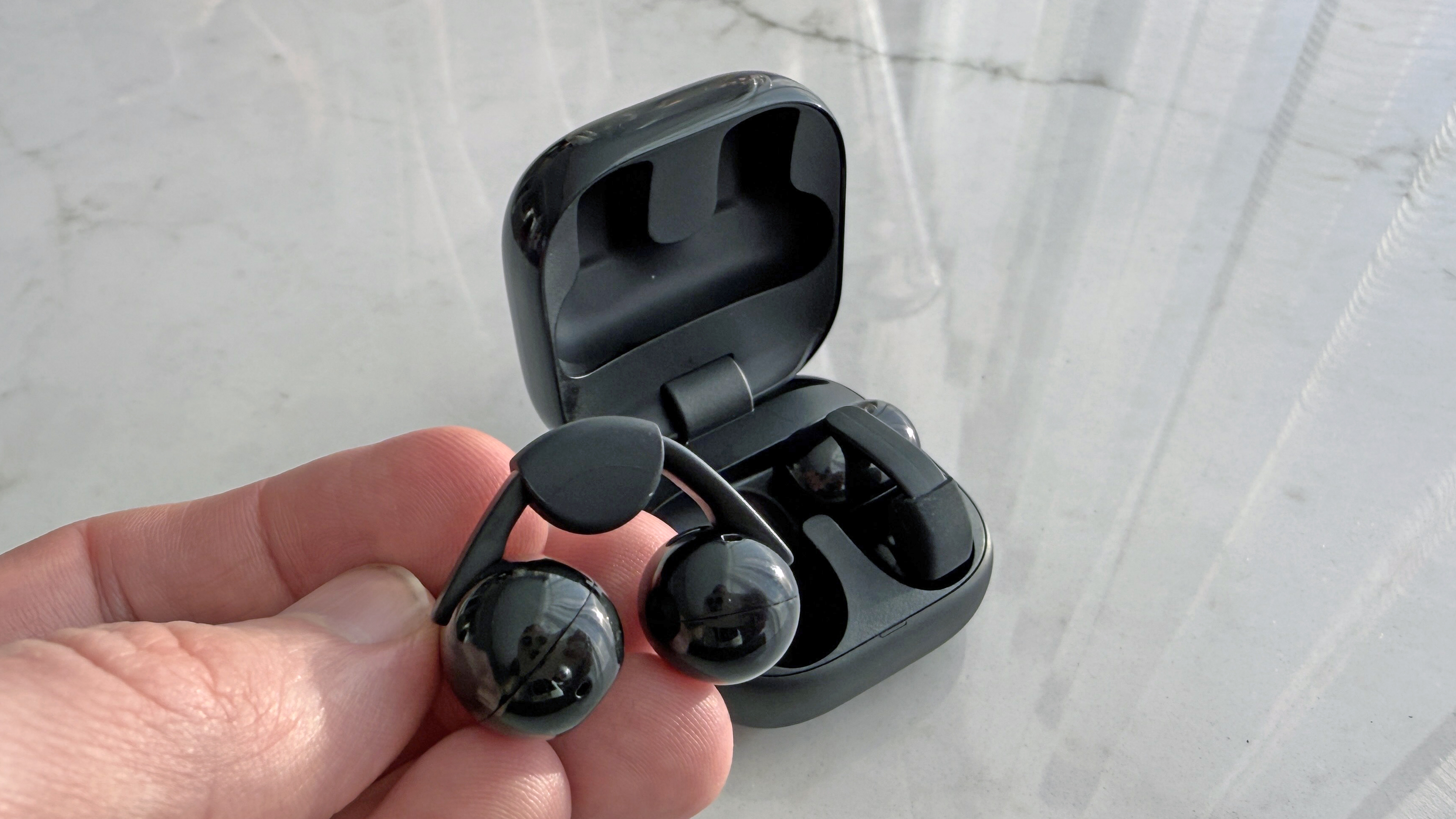 Sony LinkBuds clip in a man's hand