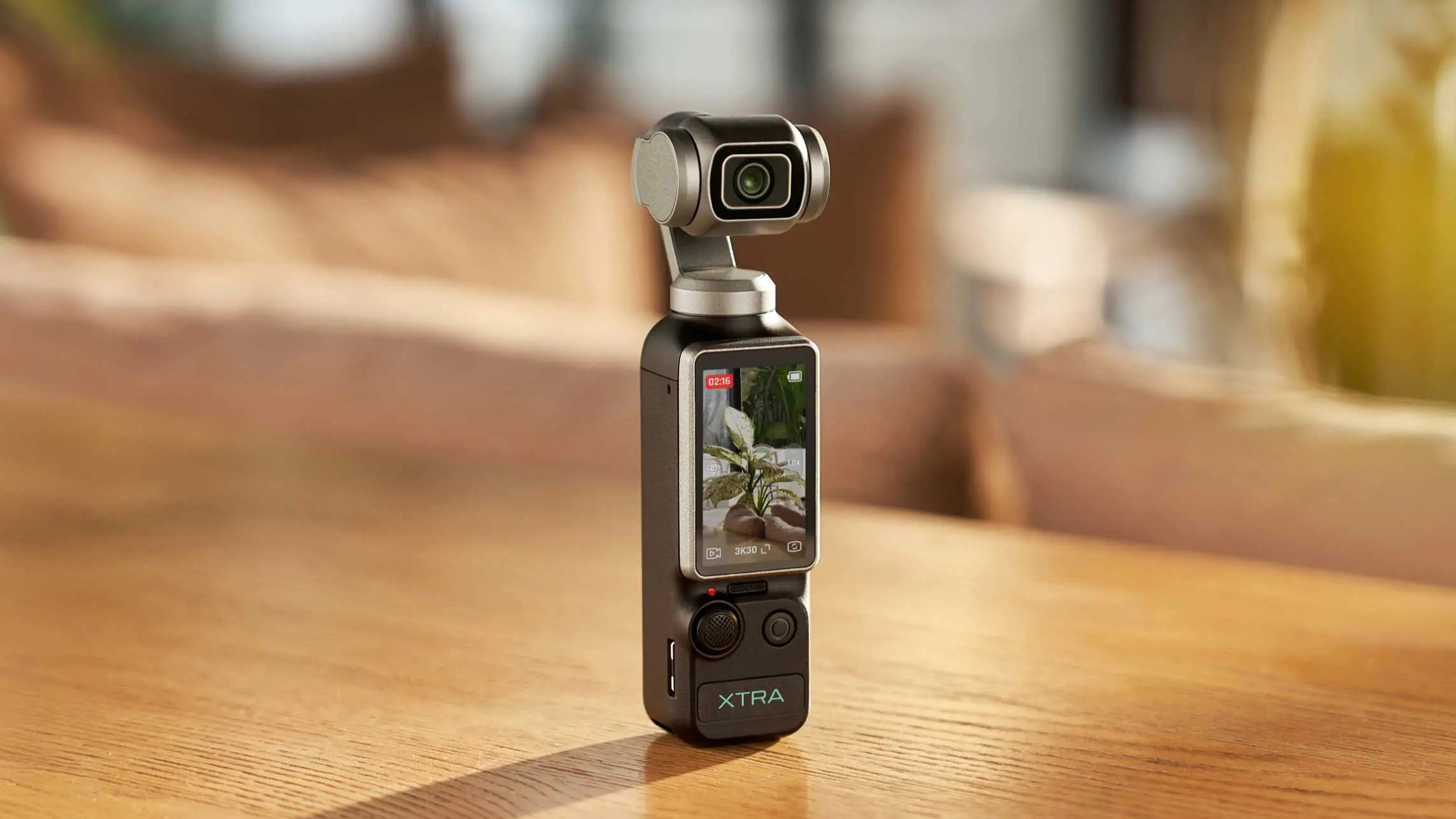 xtra mouse vlogging camera on wooden table