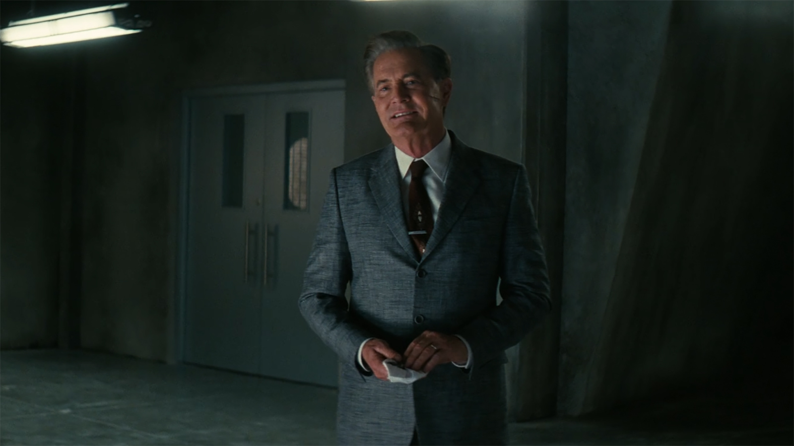 Hank holds a napkin and looks at an off-screen Lucy in Fallout Season 2 Episode 8