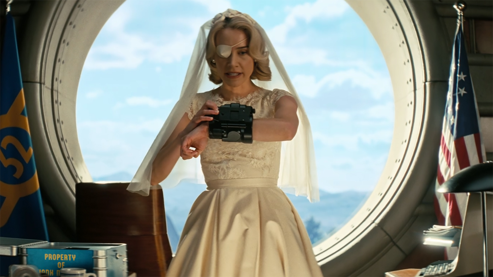 Steph talks into a black Pip-Boy in Fallout Season 2 Episode 8