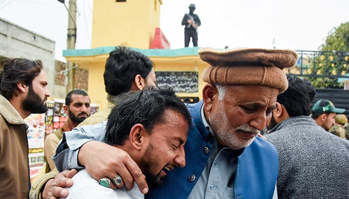 A man reacts as he is comforted after a deadly explosion at a mosque in Islamabad on February 6, 2026. — Reuters