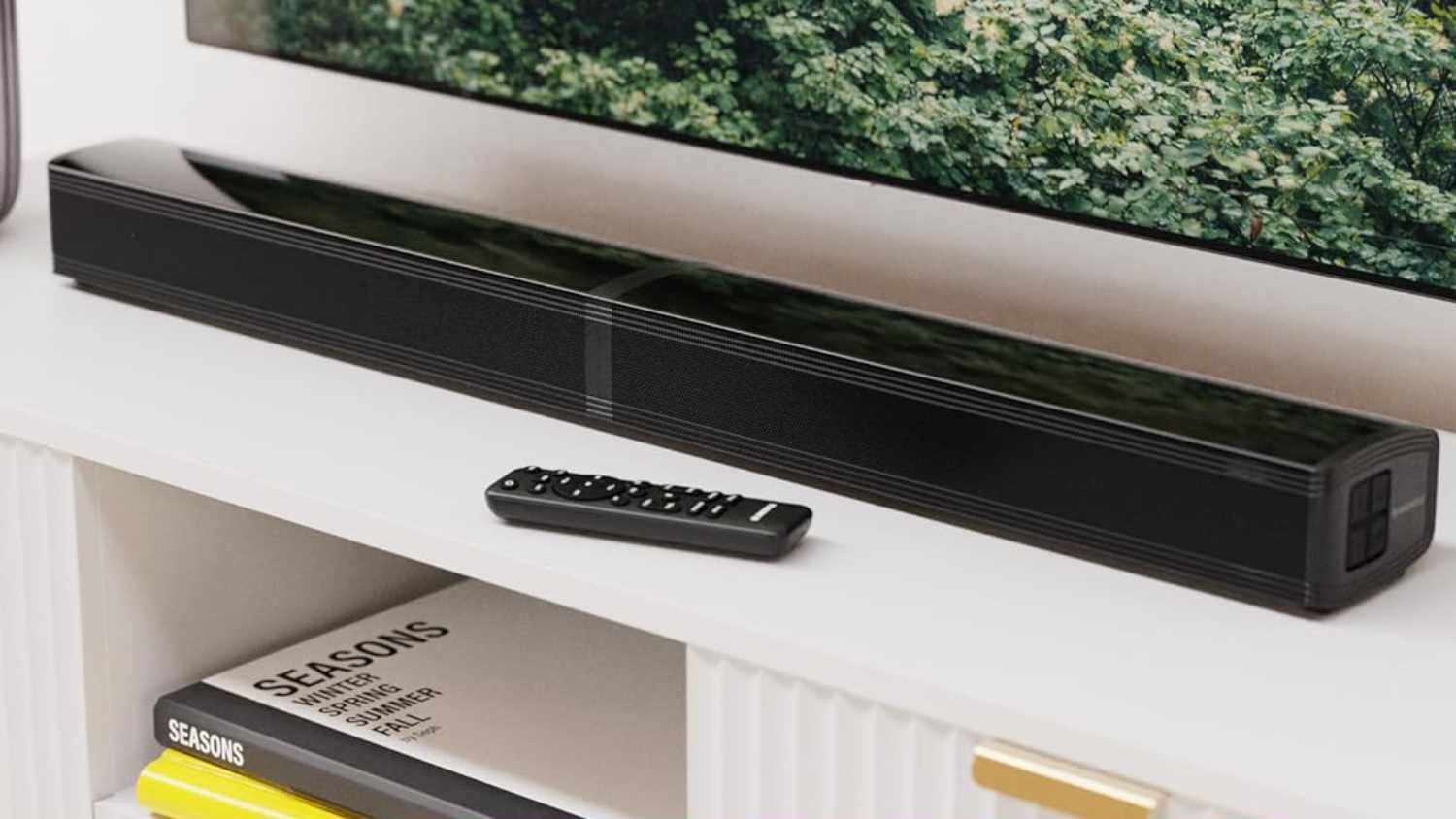 Oakcastle SB80 on a cabinet under a TV.