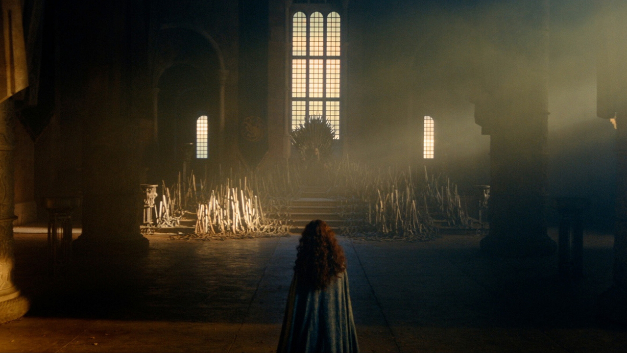A wide shot of Alicent Hightower looking at the Iron Throne in House of the Dragon Season 3