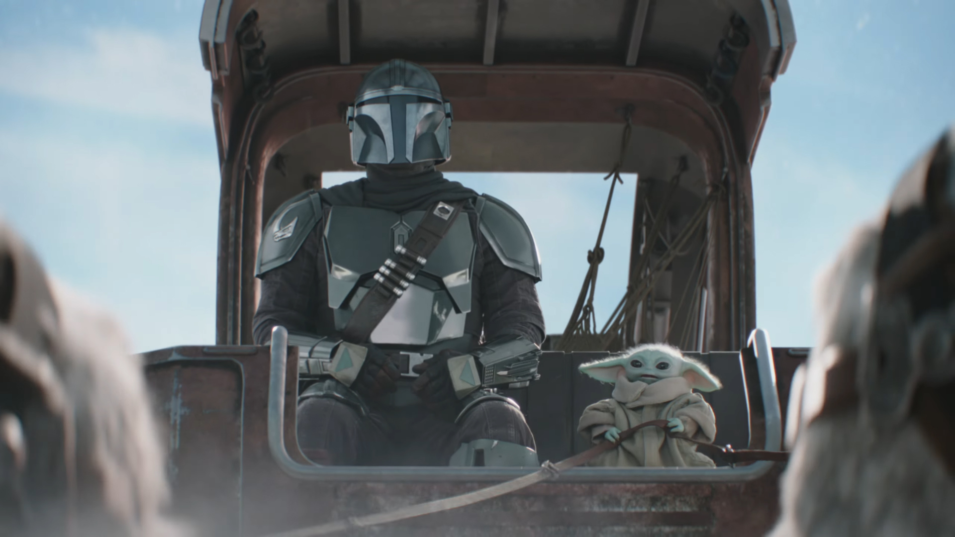 Din Djarin and Baby Yoda ride in a sled pulled by Tauntauns in The Mandalorian and Grogu Super Bowl 2026 TV spot