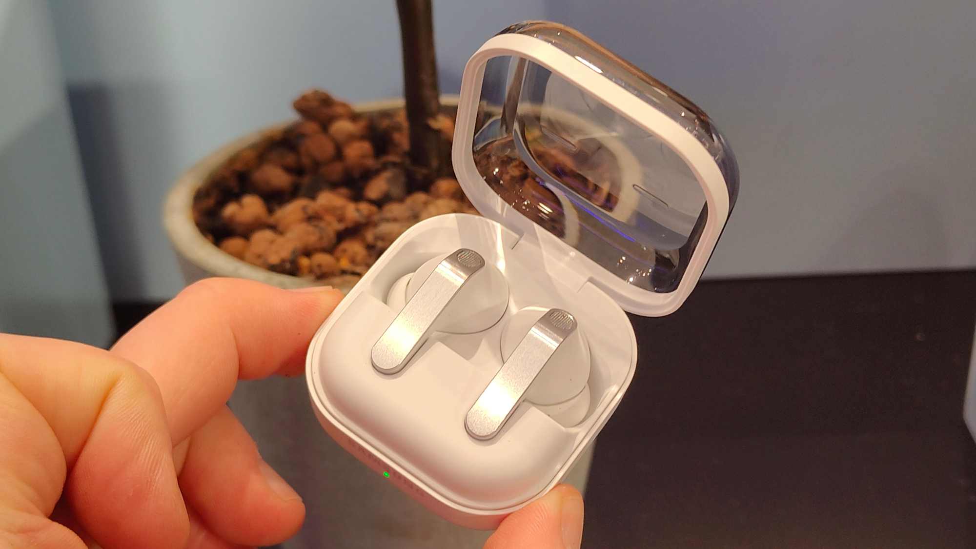 Samsung Galaxy Buds 4 Pro in their carrying case.