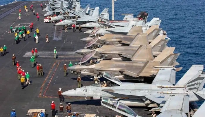 Aircraft sit on the flight deck of the US Navy Nimitz-class aircraft carrier USS Abraham Lincoln in support of the Operation Epic Fury strike on Iran on February 28, 2026. — Reuters