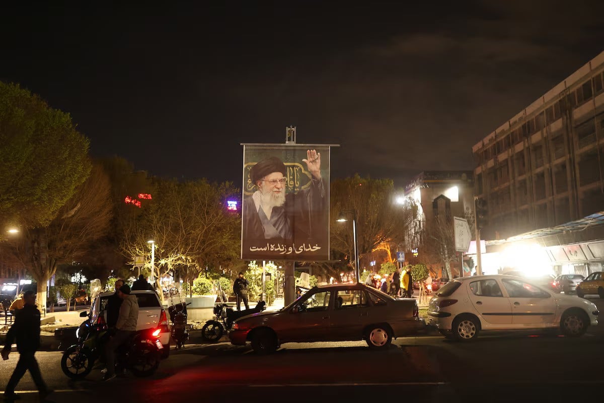 A banner of Iran's Supreme Leader Ayatollah Ali Khamenei on a street after he was killed in Israeli and US strikes on Saturday, in Tehran, Iran, March 1, 2026. — Reuters