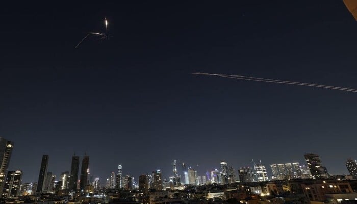 Rocket trails are seen in the sky amid a new barrage of Iranian missile strikes over the Israeli coastal city of Tel Aviv on March 3, 2026. — AFP